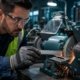 Safety inspector measuring the work rest gap on a bench grinder to verify OSHA 29 CFR 1910.215 compliance