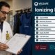 Radiation safety officer reviewing compliance checklist in hospital radiology setting